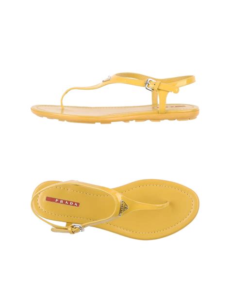 prada yellow flip flops|Prada slides on sale.